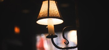 Image of electric candle light with a fabric shade.