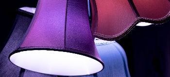 Close up of a red and purple lamp shade.